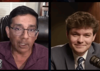 Screenshot of Nick Fuentes debating Dinesh D’Souza during an Infowars segment